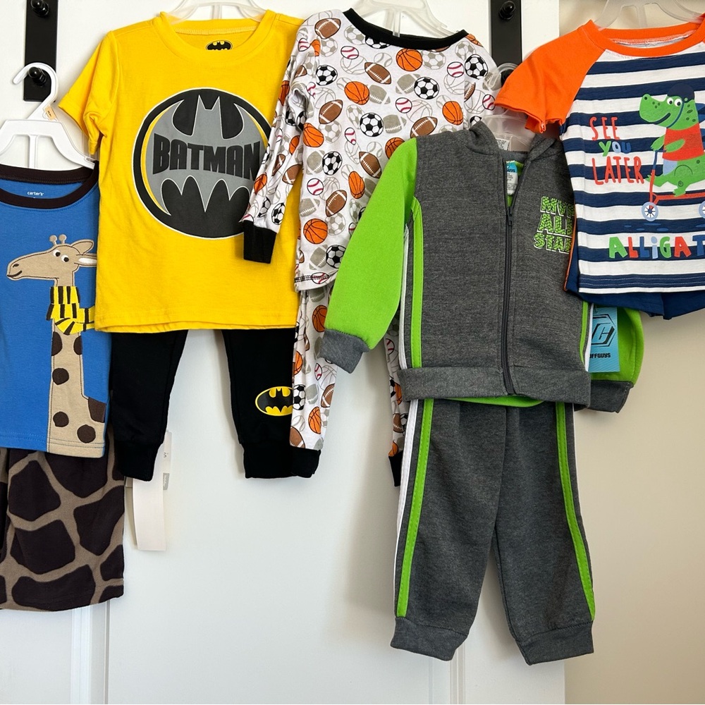 Size 2T clothes. Sports pj set is size 3T but fits like 2T. New with tags